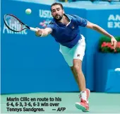  ??  ?? Marin Cilic en route to his 6-4, 6-3, 3-6, 6-3 win over Tennys Sandgren. — AFP