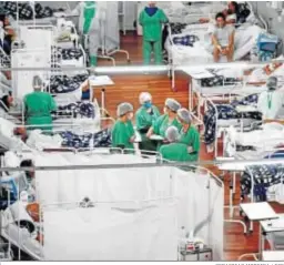  ?? SEBASTIAO MOREIRA / EFE ?? Pacientes con Covid-19 en un hospital del estado de Sao Paulo.