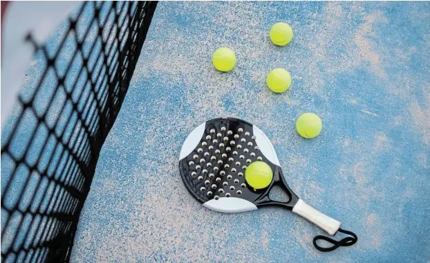  ?? Pictures: 123RF ?? BAT OF THE AGES: Though a lot like tennis, a Padel racquet is made of foam and fibreglass, or carbon fibre, rather like a space-age beach bat.