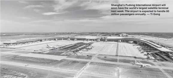  ??  ?? Shanghai’s Pudong Internatio­nal Airport will soon have the world’s largest satellite terminal next week. The airport is expected to handle 80 million passengers annually. — Ti Gong
