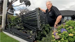  ?? GLENN JEFFREY/STUFF ?? Graham Corbett stands by the smashed fence at his Mangorei Rd property.