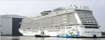  ??  ?? Norwegian Escape floating out from the Meyer Werft shipyard at Papenburg, Germany. Once final interior work is completed, Norwegian Cruise Line’s new mega-ship will launch in late October.