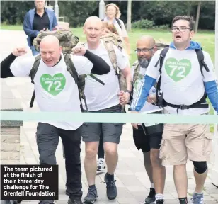  ??  ?? The team pictured at the finish of their three-day challenge for The Grenfell Foundation