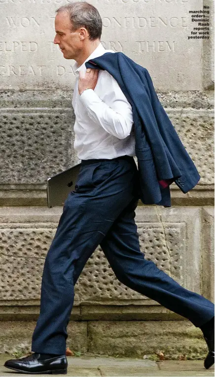  ??  ?? No marching orders... Dominic Raab reports for work yesterday