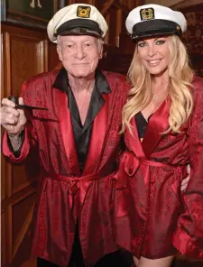  ??  ?? ‘Lucky’: Hugh Hefner and third wife Crystal Harris in matching outfits at the Playboy Mansion in 2014