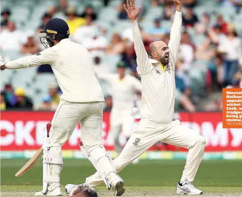  ?? PICTURES: Getty Images ?? Howzat! Australia’s Nathan Lyon appeals for the wicket of Alastair Cook, who then trudges off after being given out on review, right