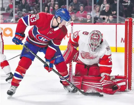  ?? MINAS PANAGIOTAK­IS/GETTY IMAGES FILES ?? “You look at where the goals are scored in any league and it’s kind of right around the net,” says Canadiens forward Daniel Carr, shown parked in front of Detroit’s Jimmy Howard during the Habs’ 10-1 rout of the Red Wings at the Bell Centre earlier...