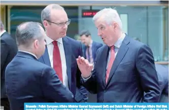  ??  ?? Brussels : Polish European Affairs Minister Konrad Szymanski (left) and Dutch Minister of Foreign Affairs Stef Blok (center) listen to Chief EU negotiator for Brexit, Michel Barnier prior to a General Affairs council on article 50 at the European...