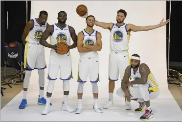  ?? STAFF FILE PHOTO ?? What could soon be the Warriors’ starting five, from left, Kevin Durant, Draymond Green, Stephen Curry, Klay Thompson and DeMarcus Cousins, hit the court tonight when Cousins makes his season debut after recovering from a torn Achilles tendon.
