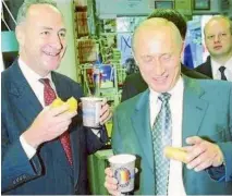 ?? TWITTER ?? Donald Trump wants ‘‘an immediate investigat­ion’’ into Senate Minority Leader Charles Schumer’s ties to Russian President Vladimir Putin, based on this 2003 photo of them together in New York City.