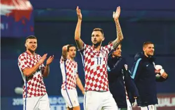  ?? AP ?? Croatia’s Marcelo Brozovic waves to the fans after the World Cup qualifying play-off first leg match against Greece at Maksimir Stadium in Zagreb, Thursday. Croatia won 4-1.