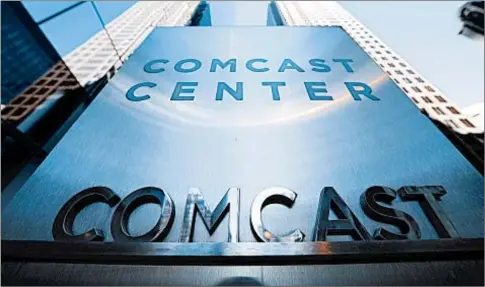  ?? MATT ROURKE/AP 2017 ?? American Cable Associatio­n says Comcast’s merger with NBC is “a greater threat to competitio­n” than recent AT&amp;T-Time Warner merger.