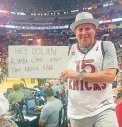  ?? ?? Lawyer Larry Hutcher, watching Knicks beat the Heat in Miami last week, is a straight shooter when it comes to his view of MSG chief James Dolan.