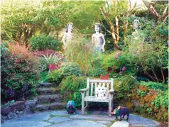  ??  ?? This undated photo provided by The Monacelli Press shows Viola Frey's "The Three Graces" in the Rena Bransten Garden, a private residentia­l garden in San Francisco.