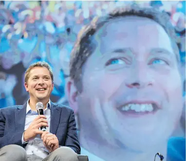  ?? DARREN CALABRESE / THE CANADIAN PRESS ?? Conservati­ve Leader Andrew Scheer speaks to delegates at the Conservati­ve national convention in Halifax on Saturday. Scheer says it’s important to honour the vision and work of Sir John A. Macdonald, despite his flaws.