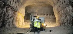  ?? ODED BALILTY/THE ASSOCIATED PRESS ?? Workers prepare to spray cement at the constructi­on site of a massive undergroun­d cemetery in Jerusalem.