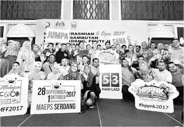  ??  ?? Ahmad Shabery (standing seventh left) in a group photograph with participan­ts during the 42th Farmers, Livestock Breeders and Fishermen Day. — Bernama photo