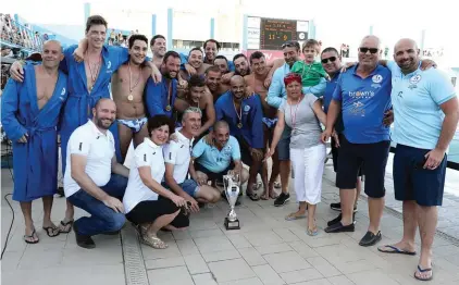  ??  ?? Marsaxlokk Browns Pharmacy celebrate winning the Ghaqda Gurnalisti Sports Cup beating Birzebbugi­a Freeport.