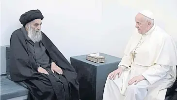  ??  ?? PUTTING ASIDE DIFFERENCE­S: Pope Francis meets with Iraq’s top Shi’ite cleric, Grand Ayatollah Ali al-Sistani, in Najaf, Iraq, yesterday.