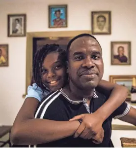  ?? USA TODAY NETWORK ?? Rony Ponthieux and daughter Ronyde Christina, 11, are facing a decision as the Temporary Protected Status program is ending.