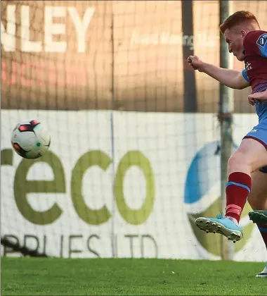  ??  ?? Stephen Dunne of Drogheda United is left powerless as Michael Duffy’s shot nestles in the net for 4-0 at United Park on Friday evening.