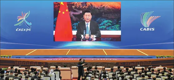  ?? PROVIDED TO CHINA DAILY ?? President Xi Jinping delivers a speech via video at the opening ceremony of the 17th ChinaASEAN Expo and ChinaASEAN Business and Investment Summit, which got underway on Friday in Nanning, the Guangxi Zhuang autonomous region.