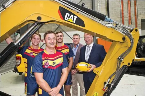  ?? PHOTO: NEV MADSEN ?? HOME GROWN: Western Mustangs (from left) Ethan Hearn, Wade Austin and James Robinson with Queensland Rugby League managing director Robert Moore and Hastings Deerings general manager Vincent Cosgrove at the announceme­nt of their new partnershi­p...