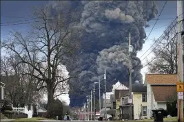  ?? GENE J. PUSKAR — THE ASSOCIATED PRESS FILE ?? A plume rises over East Palestine, Ohio, as a result of the controlled detonation of a portion of the derailed Norfolk Southern trains on Feb. 6.
