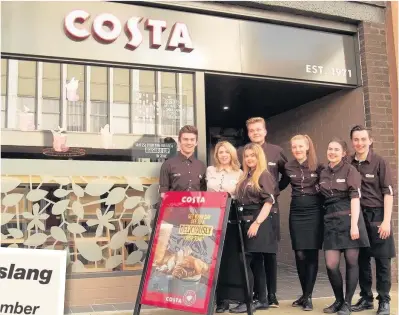  ??  ?? The Costa Coffee team with manager Kayleigh McLeod