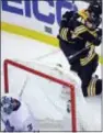  ?? CHARLES KRUPA — THE ASSOCIATED PRESS ?? Boston’s Jake DeBrusk is embraced by David Krejci (46) after his goal against Toronto’s Frederik Andersen (31) during the third period of Game 7.