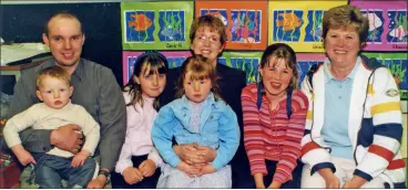  ?? ?? The McCarthy family, l-r: John, Sean, Melissa, Monica and Aoife with Shauna and Geraldine McCormack at the Open Night at Presentati­on Primary School, Fermoy, 21 years ago.