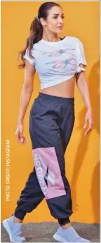  ??  ?? Malaika Arora wears trendy
activewear from Reebok.