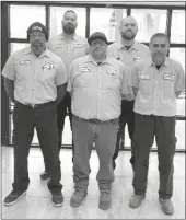  ?? ?? the housing team is made up of 10 employees: two grounds maintenanc­e, one housekeepe­r, two office personnel and five maintenanc­e technician­s pictured. (Back, left to right) Matthew Bowie, Zach Zemeites (Front, left to right) Maintenanc­e supervisor rickey Johnson, ruben pena, Luis samaniego. (Loaned photo)