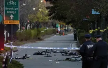  ?? CRAIG RUTTLE/THE ASSOCIATED PRESS ?? Bicycles and debris lie on a bike path after a motorist drove onto the path, killing at least eight people Tuesday.