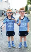  ??  ?? Dublin fans and brothers Tadhg and Jake O’Farrell (5), from Tallaght, at Croke Park. Photo: Caroline Quinn