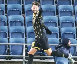  ?? (Danny Maron) ?? BEITAR JERUSALEM striker Gaetan Varenne celebrates after netting the first of his two goals in last night’s 2-1 win over Hapoel Marmorek in the State Cup roundof-16.