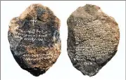  ?? FILE ?? An engraved stone found near the “Lost Colony” of Roanoke, if determined to be authentic, may provide definitive informatio­n on what happened to the early American settlement that disappeare­d around 1591.