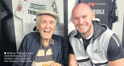  ??  ?? Widnes Vikings player Jack Buchanan joins a resident who attended the Chemics Cafe event