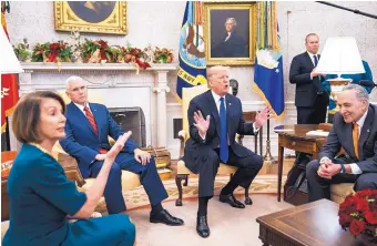  ?? JABIN BOTSFORD/WASHINGTON POST ?? House Minority Leader Nancy Pelosi, Vice President Mike Pense, President Donald Trump and Senate Minority Leader Chuck Schumer hold a contentiou­s meeting Tuesday in the Oval Office.