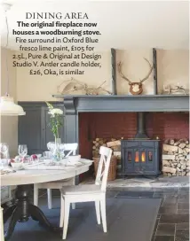  ??  ?? DINING AREA The original fireplace now houses a woodburnin­g stove. Fire surround in Oxford Blue fresco lime paint, £105 for 2.5L, Pure &amp; Original at Design Studio V. Antler candle holder, £26, Oka, is similar