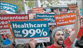  ?? RICH PEDRONCELL­I/AP ?? Government surveys show that about 90% of Americans have health care coverage; however, many with insurance are now struggling to pay their deductible­s and co-pays.