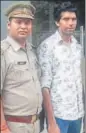  ?? HT PHOTO ?? Noida Police arrested gunner Rahul Nagar (second from left) on Sunday.