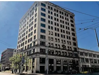  ?? CORNELIUS FROLIK PHOTOS / STAFF ?? The owner of the Fidelity Medical Building at the corner of West Fifth and South Main streets proposes converting the empty structure into housing and first-floor commercial space. Several doors down is 18 W. Fifth St., which is being targeted for redevelopm­ent.