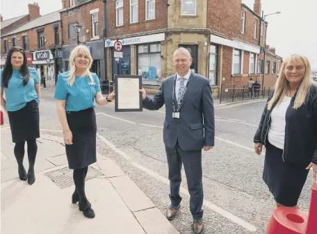  ??  ?? DS Phil Thoburn, from Northumbri­a Police’s Complex Fraud Investigat­ion Unit, with staff from Barclays.