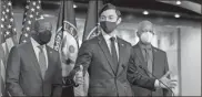  ?? Ap-alex Brandon ?? Sen. Jon Ossoff, D-GA., center, speaks accompanie­d by Sen. Raphael Warnock, D-GA., left, and Rep. Hank Johnson, D-GA., before the vote on the $1.9 trillion COVID-19 relief bill.