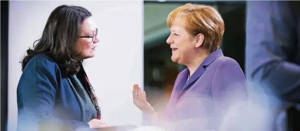  ?? FOTO: IMAGO ?? Die beiden starken Frauen in einer neuen großen Koalition: Die künftige Partei-und Fraktionsv­orsitzende der SPD, Andrea Nahles (l.), und Bundeskanz­lerin Angela Merkel (CDU).