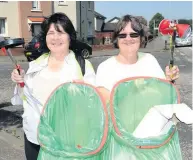  ??  ?? Helpers Jean and Barbara Donaldson get litter picking