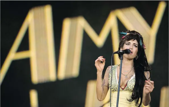 ?? — THE ASSOCIATED PRESS FILES ?? A new movie entitled Amy, directed by Asif Kapadia, sings the praises of the late Amy Winehouse, but the singer’s father, Mitch Winehouse, says it has been edited to depict the family as doing too little to help the entertaine­r overcome addiction.