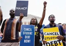  ?? Associated Press file photo ?? Students in Washington, D.C., call for student loan relief last year. The latest such program by the Biden administra­tion would help more than 25 million borrowers.