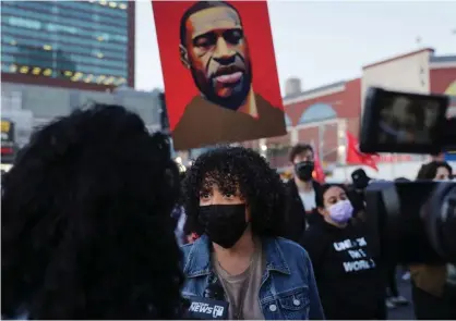  ?? Photograph: Jeenah Moon/Reuters ?? Dianne Morales outside Barclays Center after the verdict in the Derek Chauvin trial, in Brooklyn, New York, on 20 April.